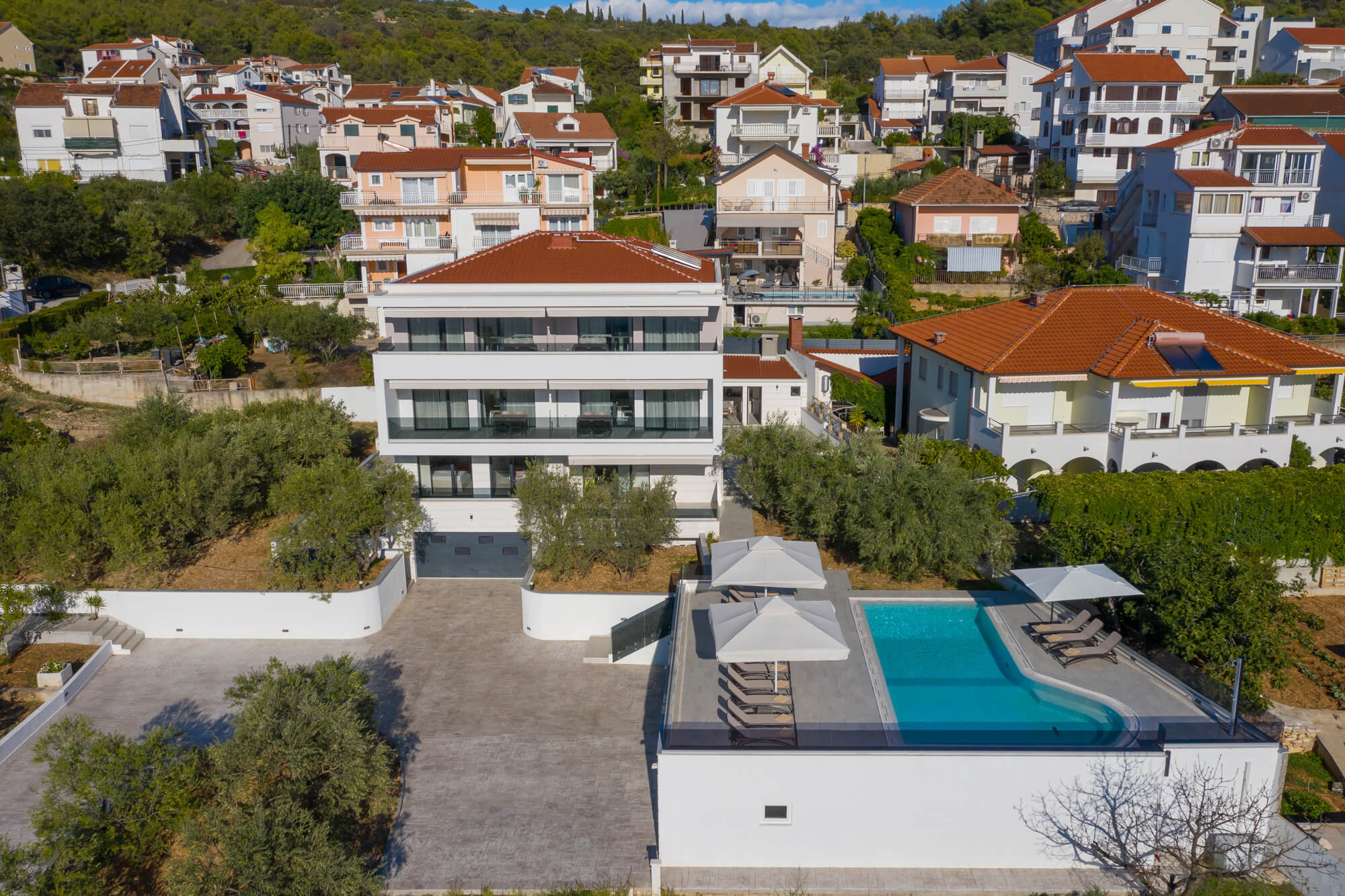 villa dora and neghborhood frontal aerial view