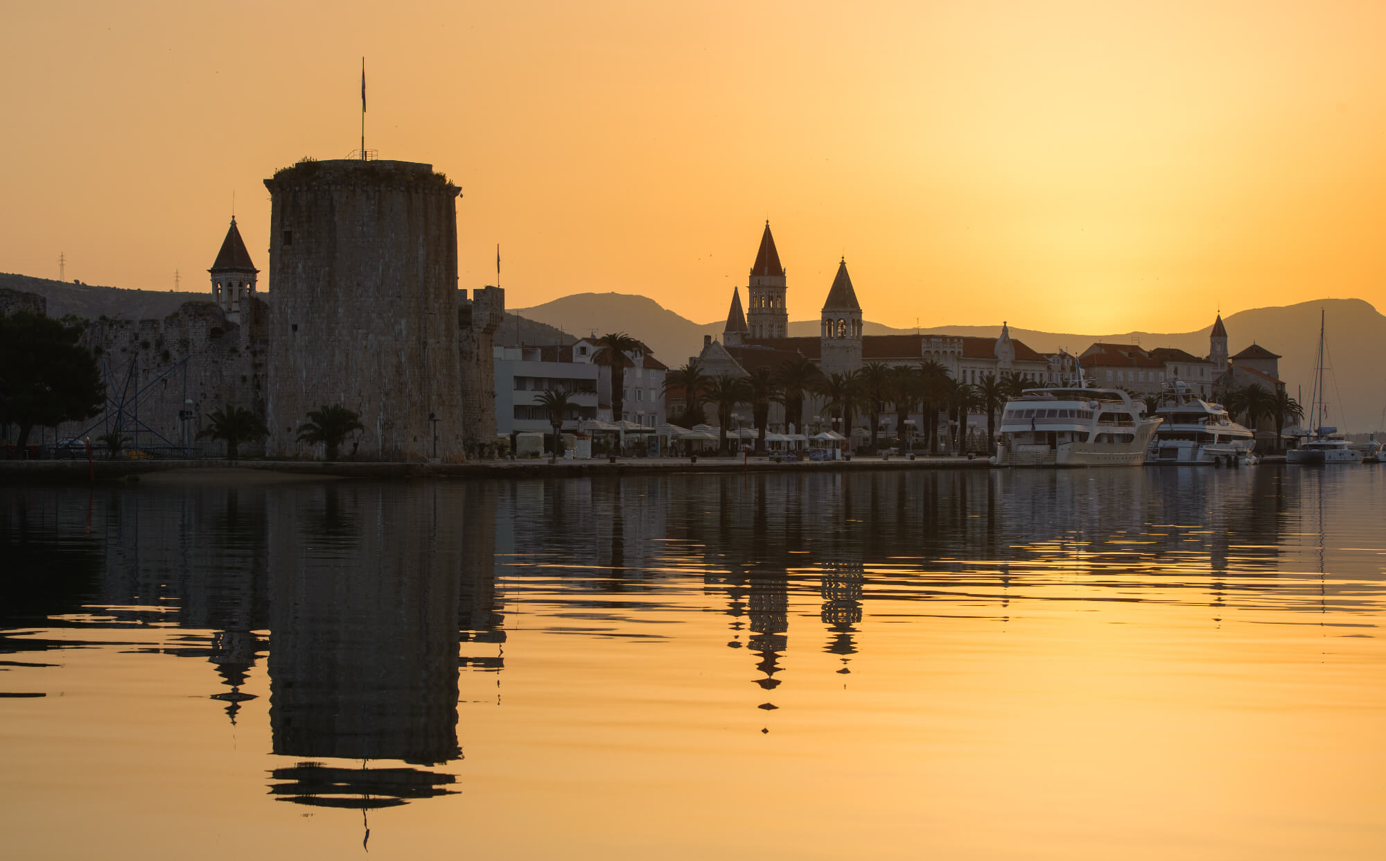 The coast of the city of Trogir at sunset